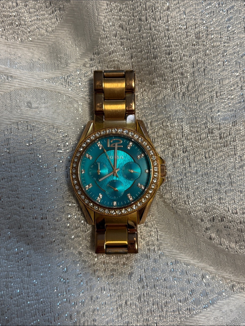 Fossil Gold Tone Bracelet Watch with Teal Dial and Crystal Bezel